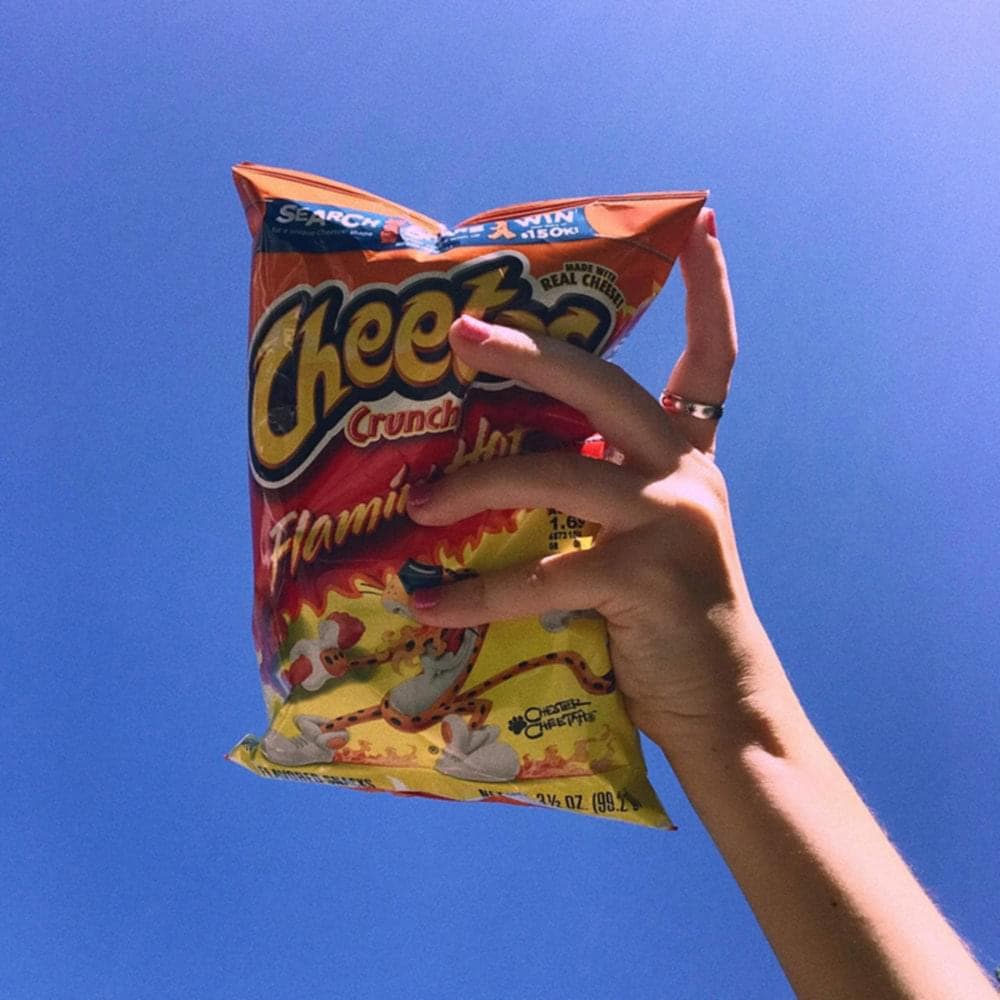 Album cover art for "Flaming Hot Cheetos" by Clairo