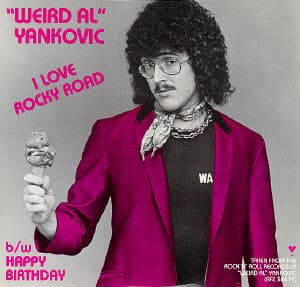 Album cover art for "Lola Indigo & Kidd Voodoo - Q SOMOS? (English Translation)" by “Weird Al” Yankovic