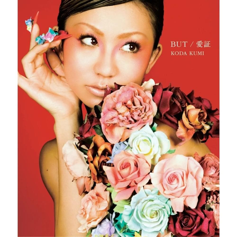 Album cover art for "BUT" by 倖田來未 (Kumi Koda)