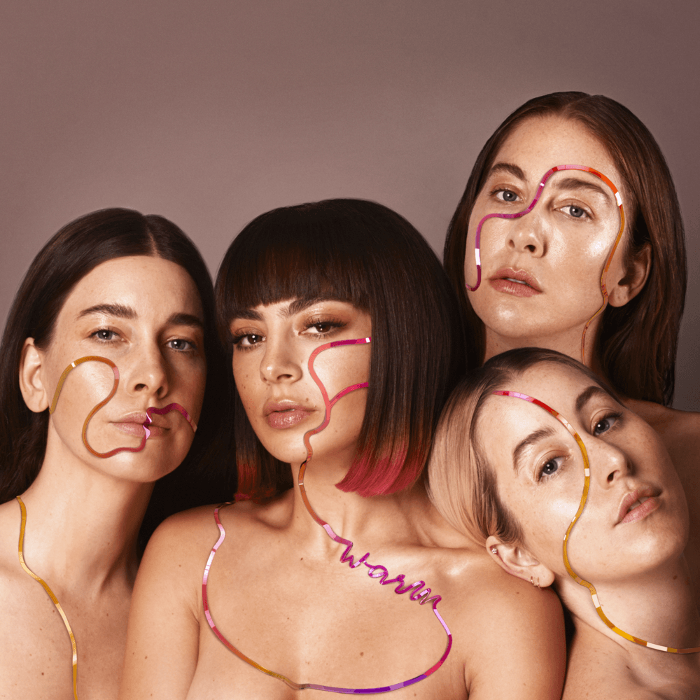 Album cover art for "Warm" by Charli xcx & HAIM