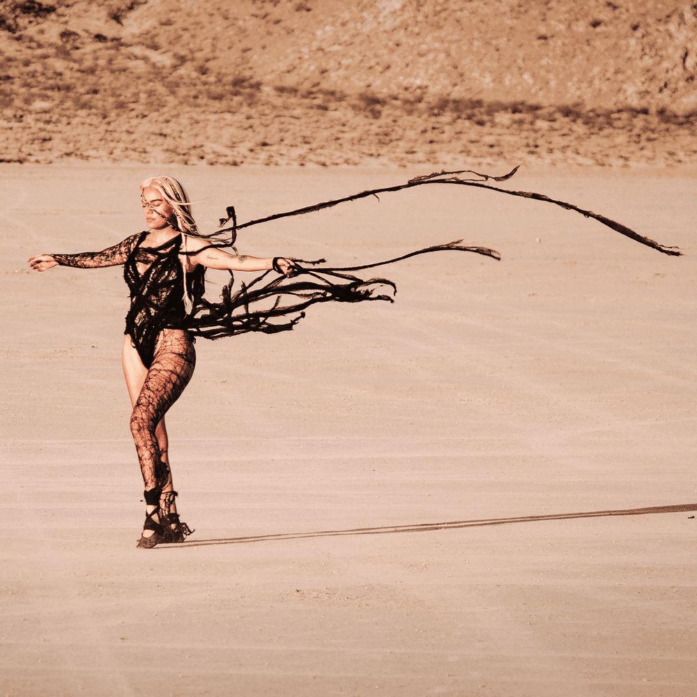 Album cover art for "S91" by KAROL G