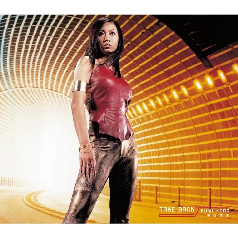 Album cover art for "TAKE BACK" by 倖田來未 (Kumi Koda)