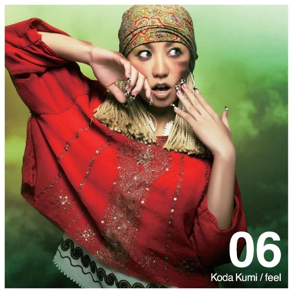 Album cover art for "​feel" by 倖田來未 (Kumi Koda)