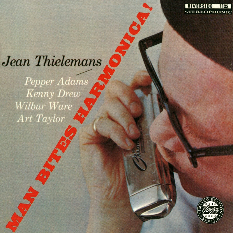 Man Bites Harmonica!