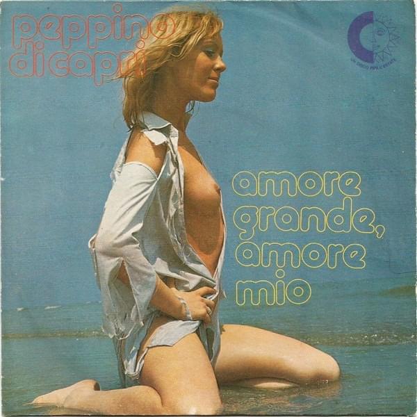 Amore grande, amore mio / E ridendo... ridendo