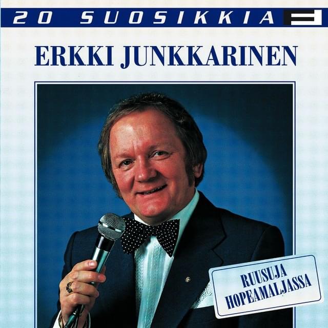 Ruusuja hopeamaljassa