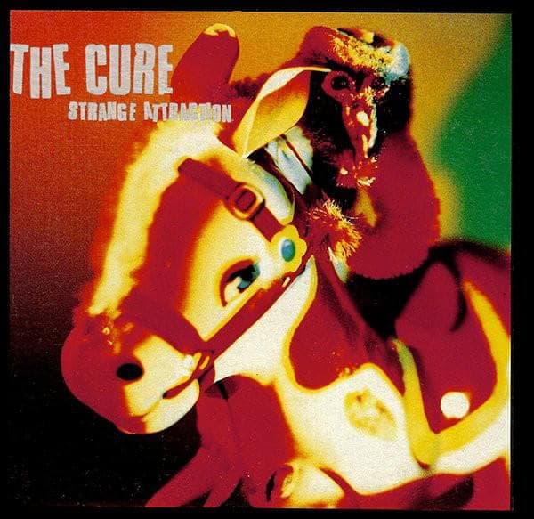 Album cover art for "Strange Attraction" by The Cure