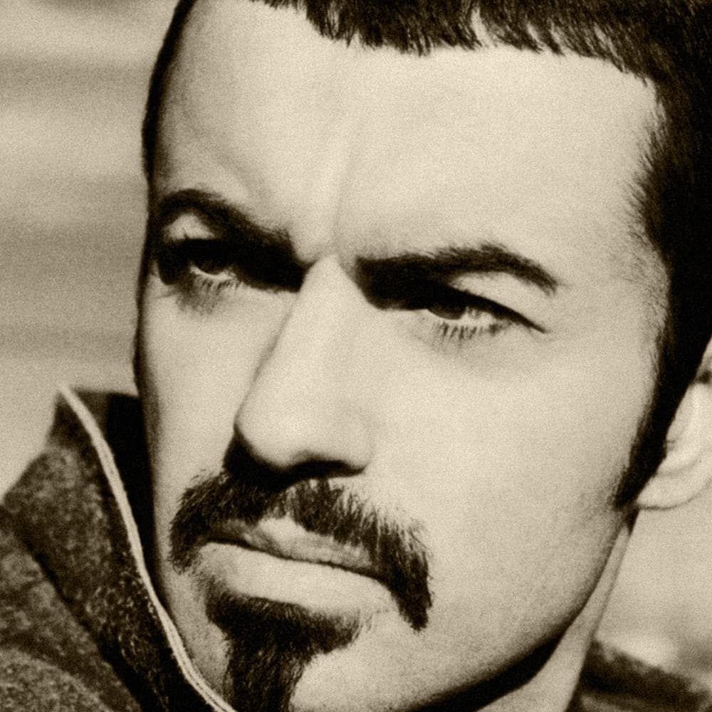 Album cover art for "Spinning the Wheel" by George Michael