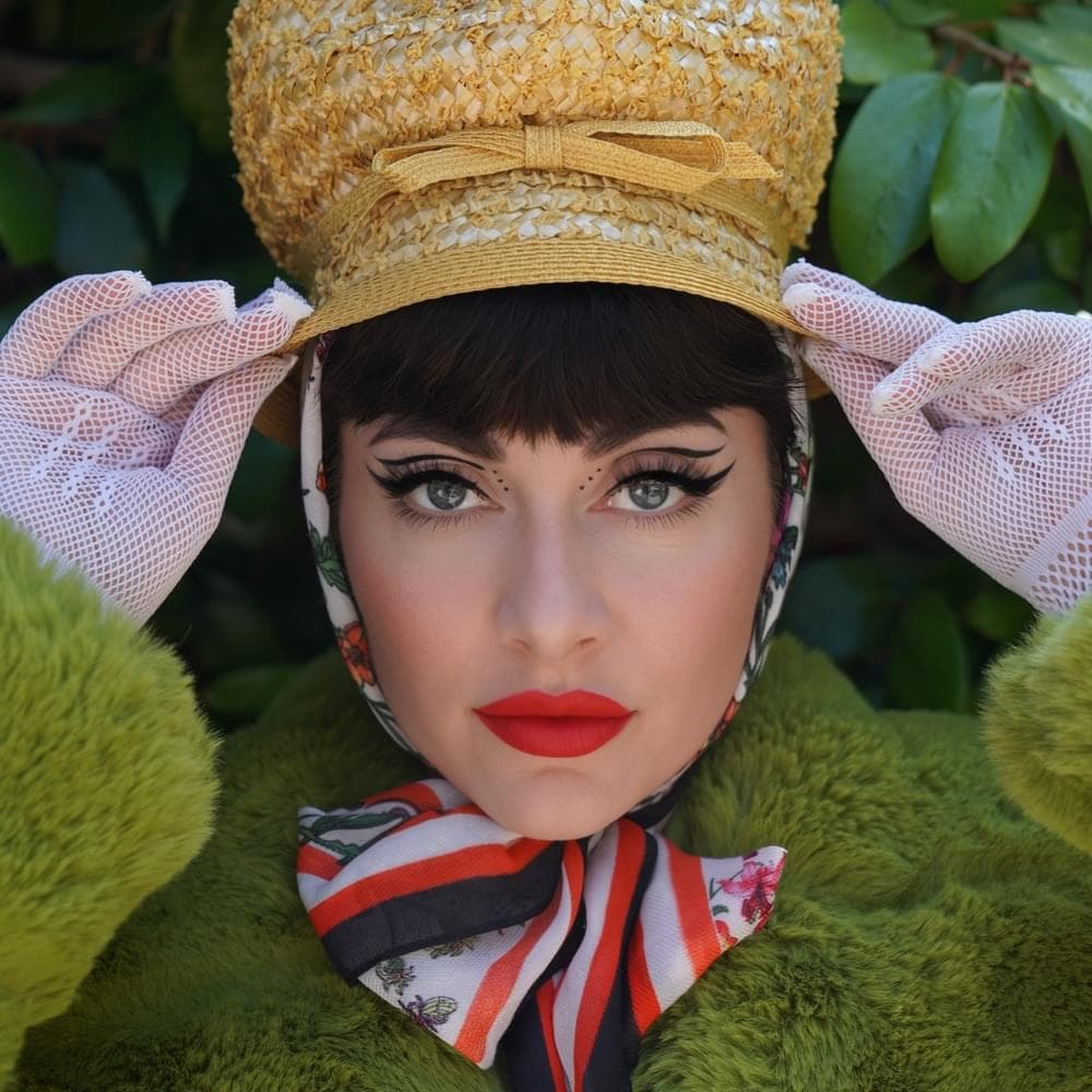 Album cover art for "Sensational" by Qveen Herby